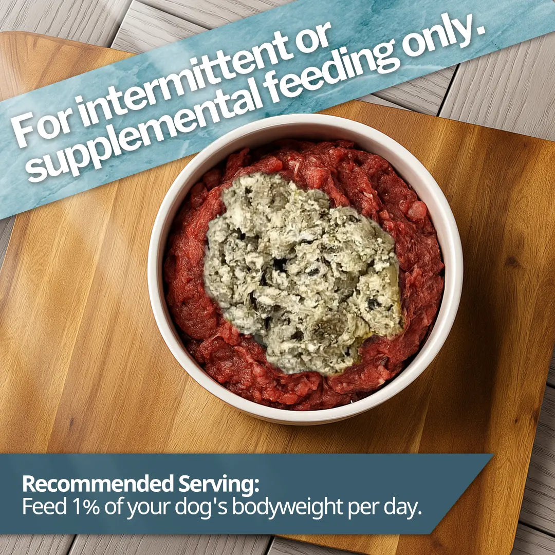 raw dog food in a bowl at the top of a wooden board with a note of "For intermittent or supplemental feeding only" and "recommended Serving"