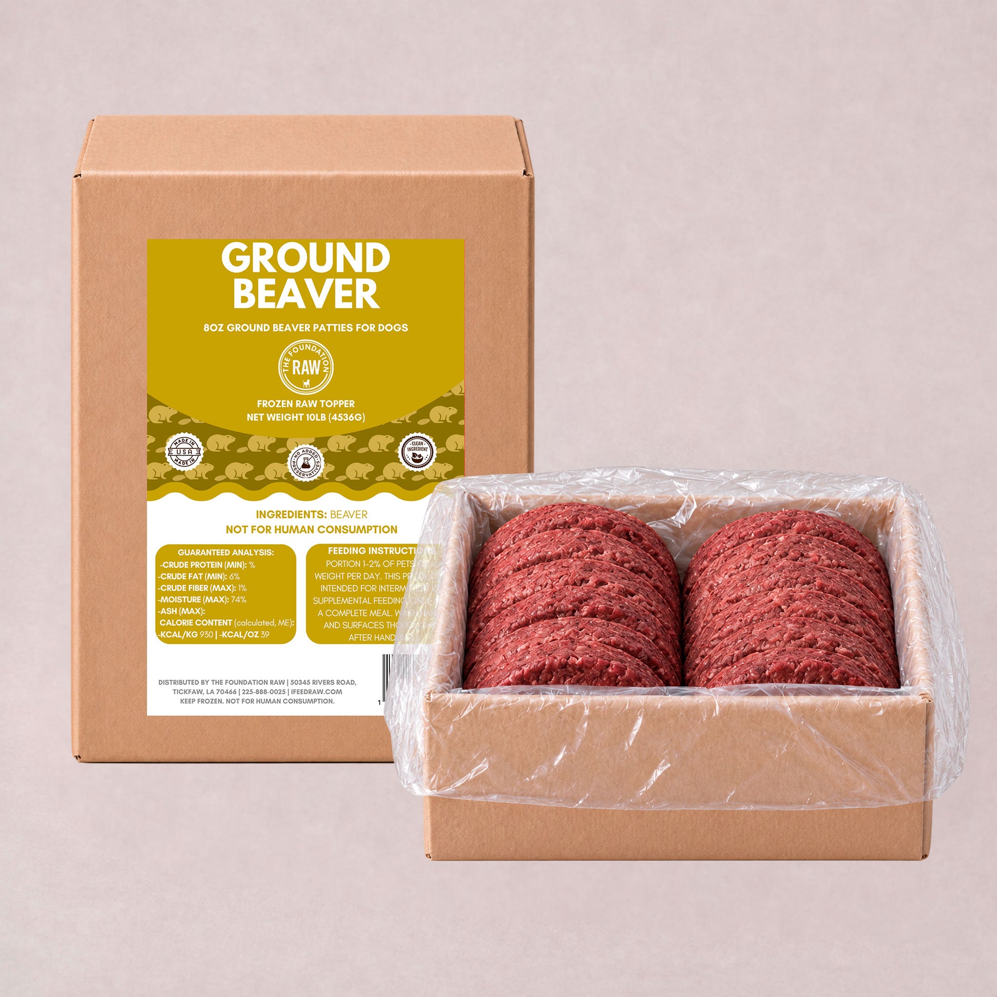 A cardboard box labeled 'GROUND BEAVER' stands behind an open box containing two stacked slices of ground beef patty wrapped in clear plastic, on a plain light beige background.